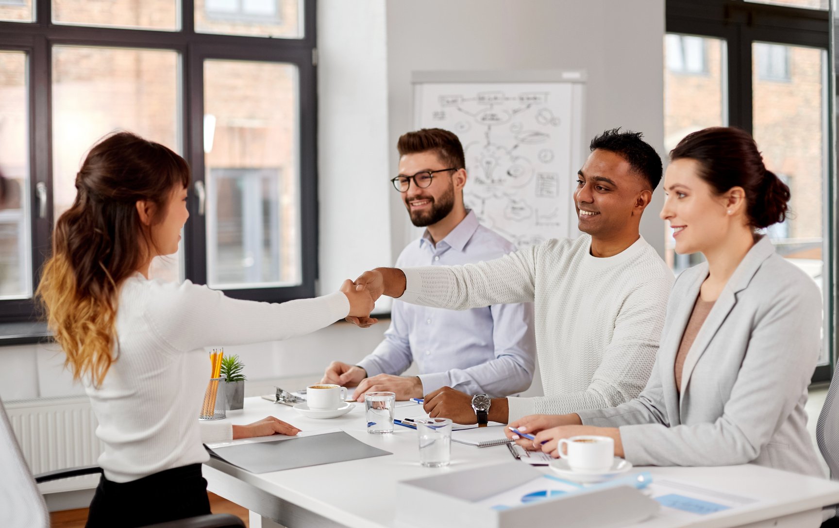 Recruiters Having Job Interview with Employee